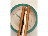 「ファミリーマート 香ばしいクッキーのクリームサンド レーズン」のクチコミ画像 by こっぱるママさん