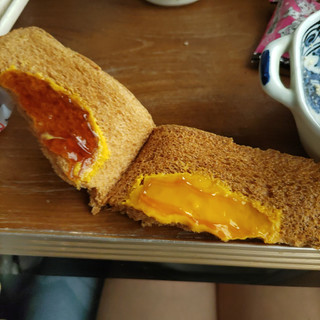 「フジパン 黒糖スナックサンド かぼちゃプリン味 袋2個」のクチコミ画像 by 久やんさん